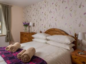 Postelja oz. postelje v sobi nastanitve 4 Bed in Brecon BN151