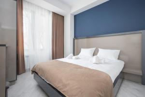 Voodi või voodid majutusasutuse Hotel Armeni toas