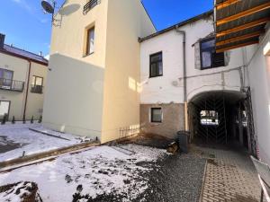 an outside view of a building with a tunnel at Little Universe in Liptovský Mikuláš