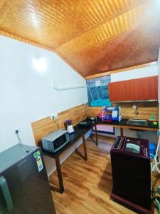 TV a/nebo společenská místnost v ubytování Sherly Cottages