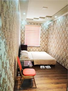 Posteľ alebo postele v izbe v ubytovaní Temur Hotel