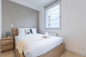 Posteľ alebo postele v izbe v ubytovaní Lille Saint-Michel Fully-equipped studio