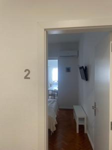 Televizors / izklaižu centrs naktsmītnē Inncork Guesthouse