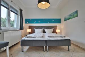 Postel nebo postele na pokoji v ubytování Ferienhaus Kiki Ferienhaus Kiki