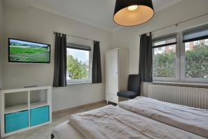 Postel nebo postele na pokoji v ubytování Ferienhaus Kiki Ferienhaus Kiki