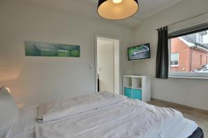 Postel nebo postele na pokoji v ubytování Ferienhaus Kiki Ferienhaus Kiki