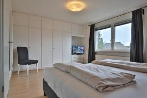 Postel nebo postele na pokoji v ubytování Ferienhaus Kiki Ferienhaus Kiki