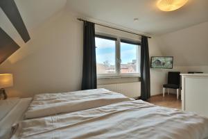 Postel nebo postele na pokoji v ubytování Ferienhaus Kiki Ferienhaus Kiki