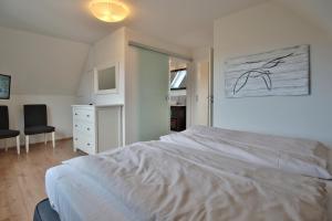 Postel nebo postele na pokoji v ubytování Ferienhaus Kiki Ferienhaus Kiki