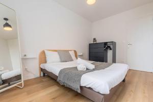 Posteľ alebo postele v izbe v ubytovaní Charming apartment 2ch 4p parking and balcony