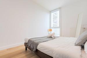 Posteľ alebo postele v izbe v ubytovaní Charming apartment 2ch 4p parking and balcony