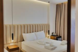 Postel nebo postele na pokoji v ubytování Hotel Siars