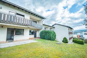 an image of a house with a yard at Aparthotel Panorama in Bad Soden-Salmünster