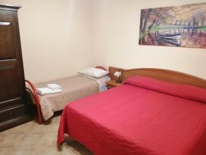 Posteľ alebo postele v izbe v ubytovaní Baglio delle Rondini - Piano Terra