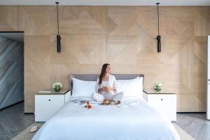 Vuode tai vuoteita majoituspaikassa Rixos Gulf Hotel Doha