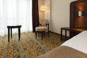 Postel nebo postele na pokoji v ubytování Hotel Schopenhauer Hof