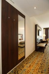 Postel nebo postele na pokoji v ubytování Hotel Schopenhauer Hof