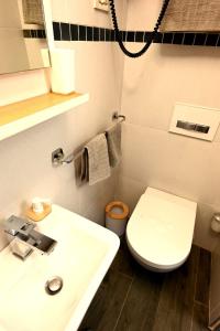 Koupelna v ubytování Bel-Art