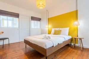 Posteľ alebo postele v izbe v ubytovaní 2-bedroom apartment near metro