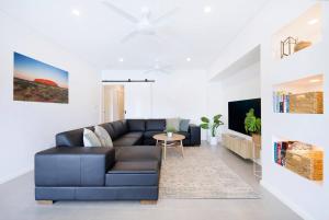 A seating area at 'Infinity's Edge' Darwin Luxury Waterfront Oasis