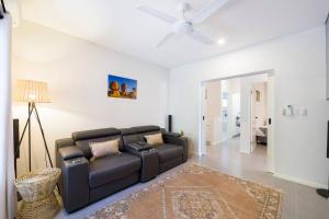 A seating area at 'Infinity's Edge' Darwin Luxury Waterfront Oasis