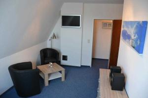 TV a/nebo společenská místnost v ubytování _DKK11_ Ferienwohnung Strandburg