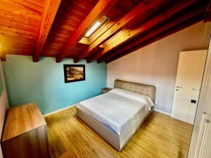 Ένα ή περισσότερα κρεβάτια σε δωμάτιο στο Colico Zen House