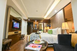 TV a/nebo společenská místnost v ubytování Flute Boutique by Hotel 91