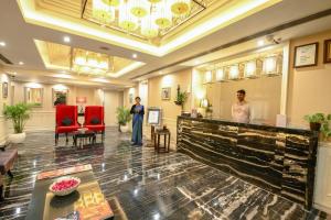 Členové personálu v ubytování Flute Boutique by Hotel 91