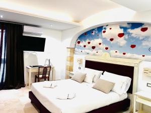 Relais Porta del Sud客房内的一张或多张床位