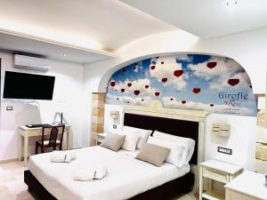 Relais Porta del Sud客房内的一张或多张床位