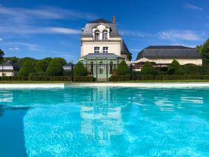Piscine de l'établissement Château de Courcelles - Relais & Châteaux ou située à proximité