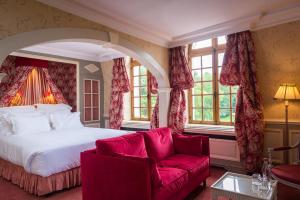 Un ou plusieurs lits dans un hébergement de l'établissement Château de Courcelles - Relais & Châteaux