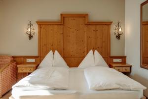 Postel nebo postele na pokoji v ubytování Hotel Lerch
