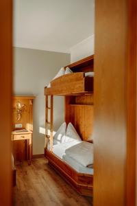 Postel nebo postele na pokoji v ubytování Hotel Lerch
