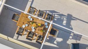 an overhead view of a table and chairs on a street at Villa Tyra in Ražanj