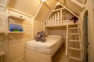 Un pat sau paturi într-o cameră la Albergo Losone