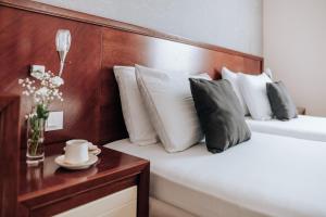 Voodi või voodid majutusasutuse Apartments Del Mar toas