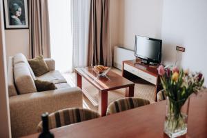 Televiisor ja/või meelelahutuskeskus majutusasutuses Apartments Del Mar
