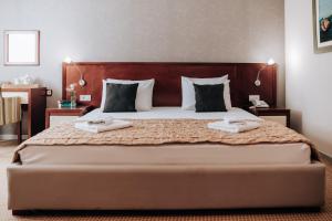 Voodi või voodid majutusasutuse Apartments Del Mar toas
