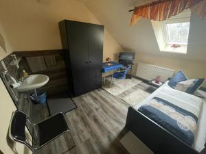 Postel nebo postele na pokoji v ubytování Pension Krahmer