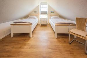 Кровать или кровати в номере Wattperle