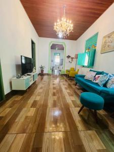 TV a/nebo společenská místnost v ubytování Casa com Piscina