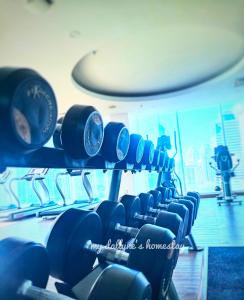 a row of dumbbells in a gym at My Dallyne's Residence at Tamu Hotel & Suites, Kuala Lumpur in Kuala Lumpur