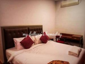 Postelja oz. postelje v sobi nastanitve My Dallyne's Residence at Tamu Hotel & Suites, Kuala Lumpur