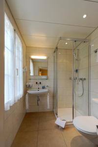 Ein Badezimmer in der Unterkunft Seehof Hotel Du Lac