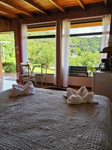 Voodi või voodid majutusasutuse Monteluna Studios Monteverde toas