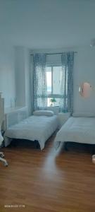 Postel nebo postele na pokoji v ubytování 1st line sea view 3 rooms apartment in Tenerife 92m2