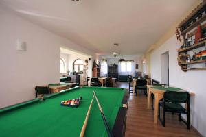 a living room with a pool table in it at Pokoje gościnne Kamińscy in Gliczarów