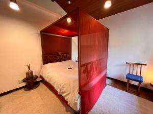 Кровать или кровати в номере Paraíso na praia do Guaiu